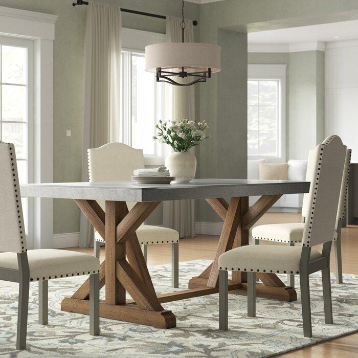 Mesa de comedor Polonia en madera lenga a medida — base pilares ensamblados, disponible en múltiples tonos incluido look cemento — Greenwoods Chile